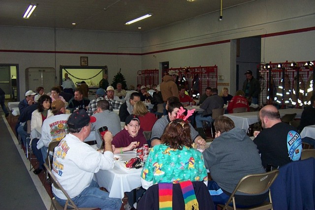 Lunch is served at the annual Xmas Turkey Feast, December 2005